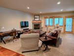 Enjoy peaceful views of the Mt Hood National Forest and Collins Lake from the living room windows